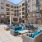 resort style pool with seating and tvs
