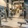 Large fitness center with cardio and weight lifting equipment.